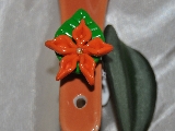 Bague fleur orange sur feuille